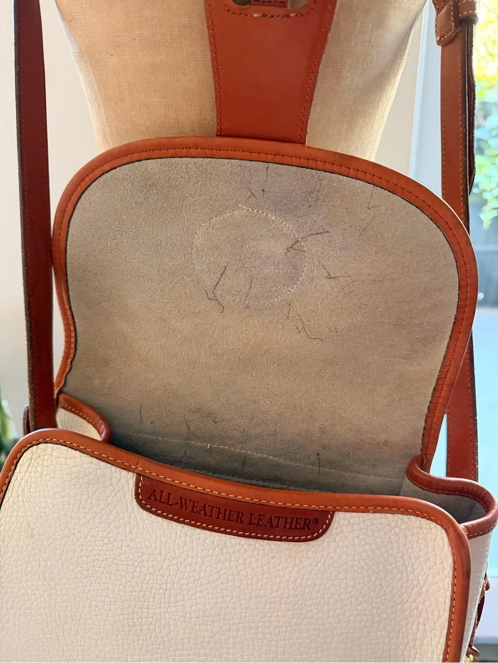 Dooney & Bourke cream pebbled